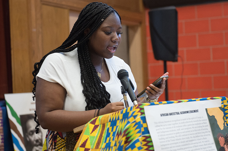 Past African Heritage Student Makafui Ocloo reading Land Acknowledgement and African Ancestral Acknowledgement - African Ancestral Acknowledgement written by Natasha Henry. Open Gallery